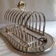 Taost door in silver metal