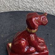 Dog sign CAB in vintage burgundy red enameled ceramic slip, art deco