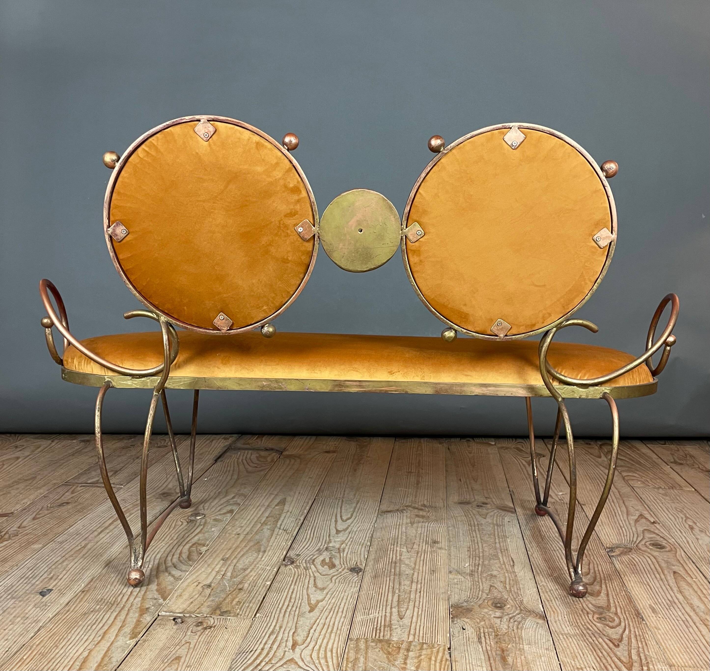 Wrought iron and velvet sofa