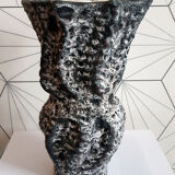 Black and white speckled ceramic vase signed Annette ROUX.