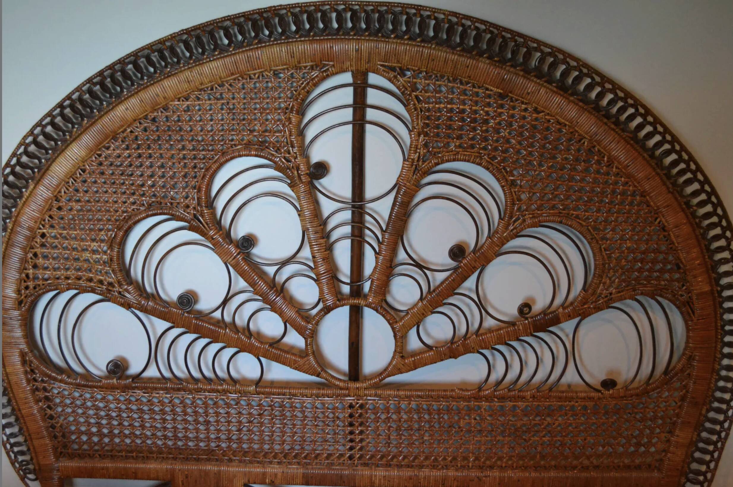 Brown peacock headboard for a 140cm bed.