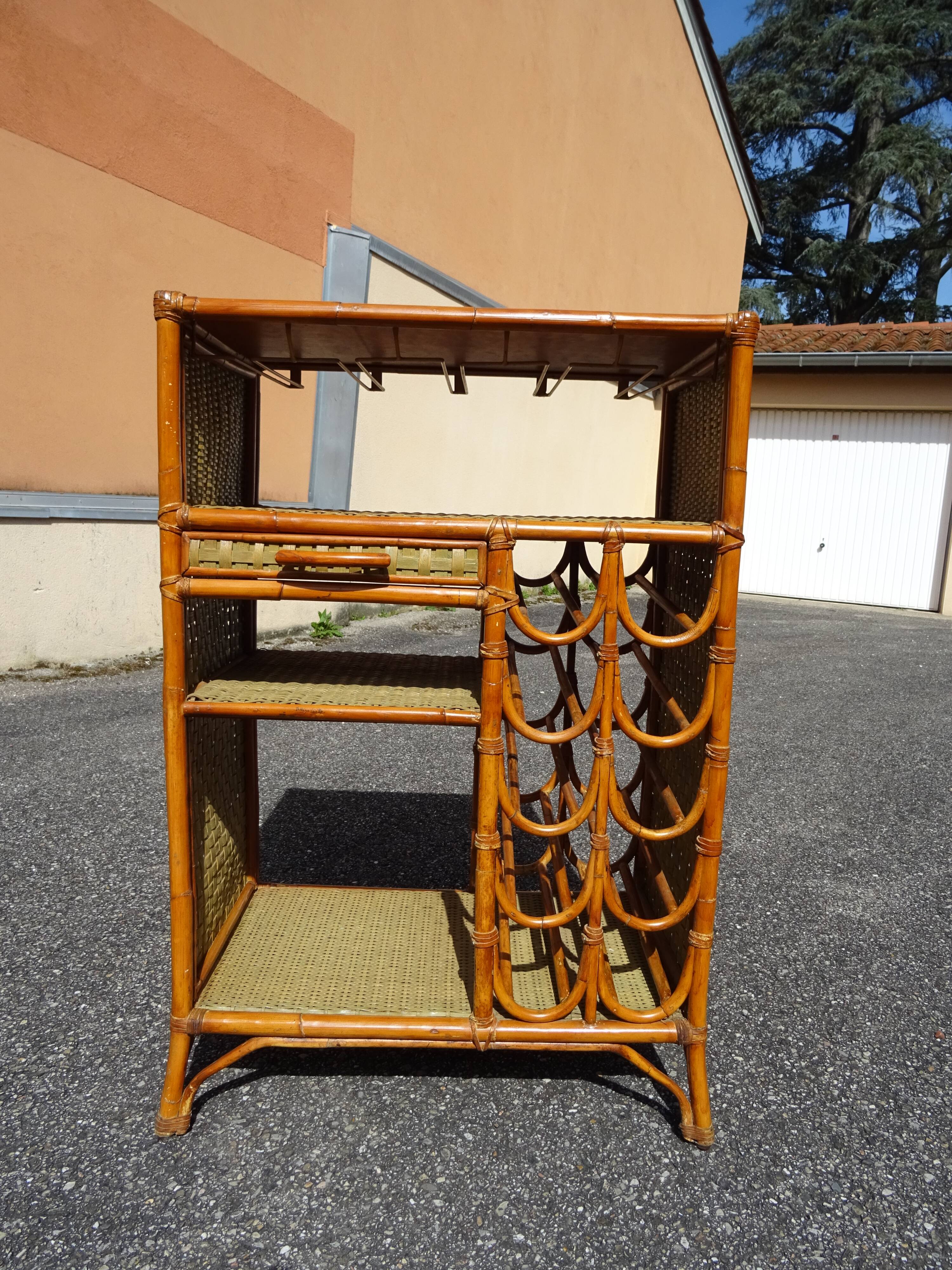 Vintage rattan bar cabinet from the 60s/70s