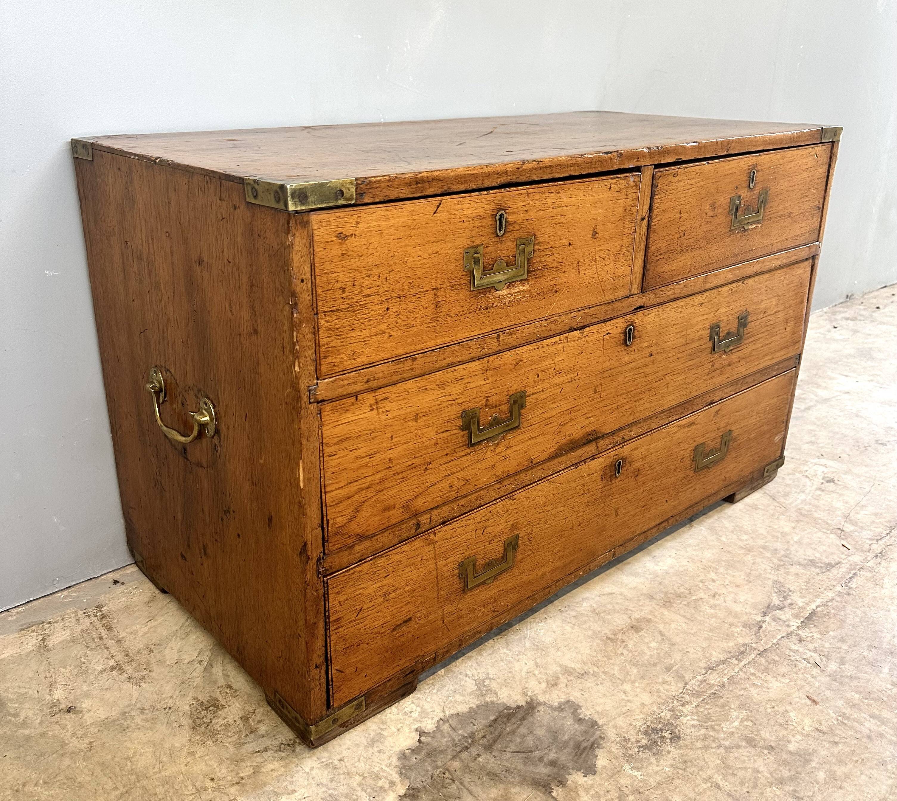 Small marine chest of drawers in wood and brass