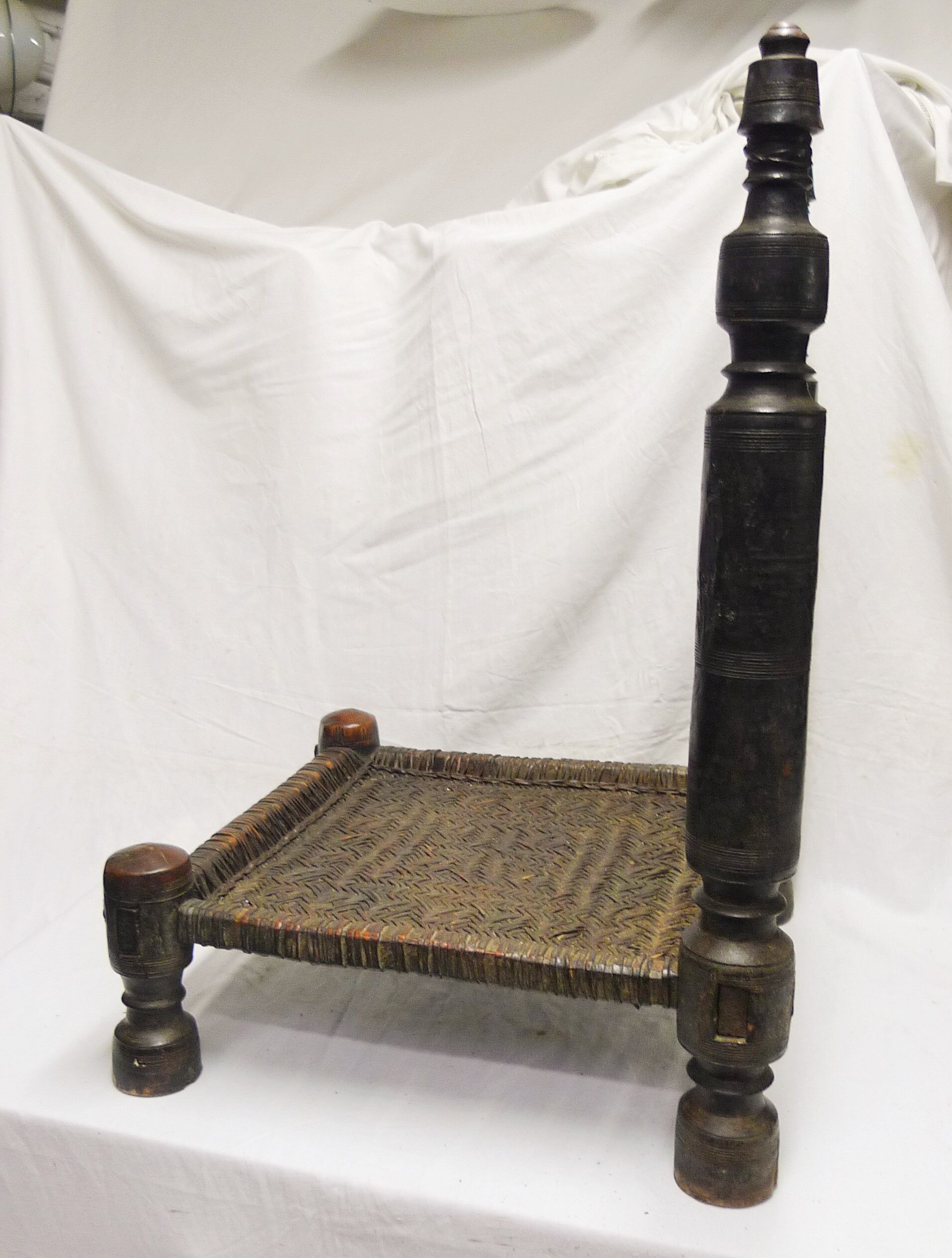 Traditional low chair in wood and leather