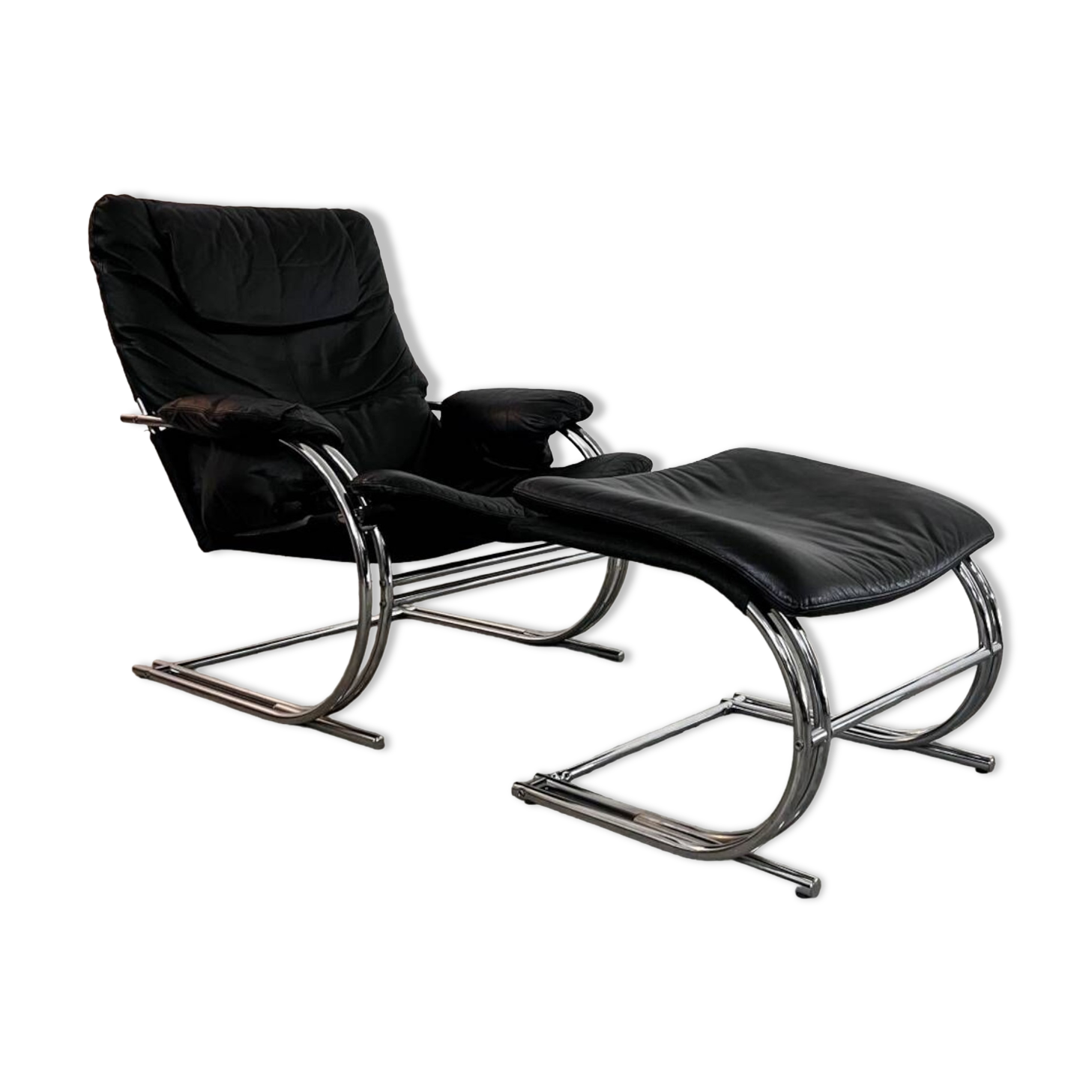 Old armchair and ottoman black leather tubular chrome bauhaus design from the 70s
