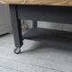 Coffee table on casters made from a vintage table, 1 drawer, 1 slate gray shelf.