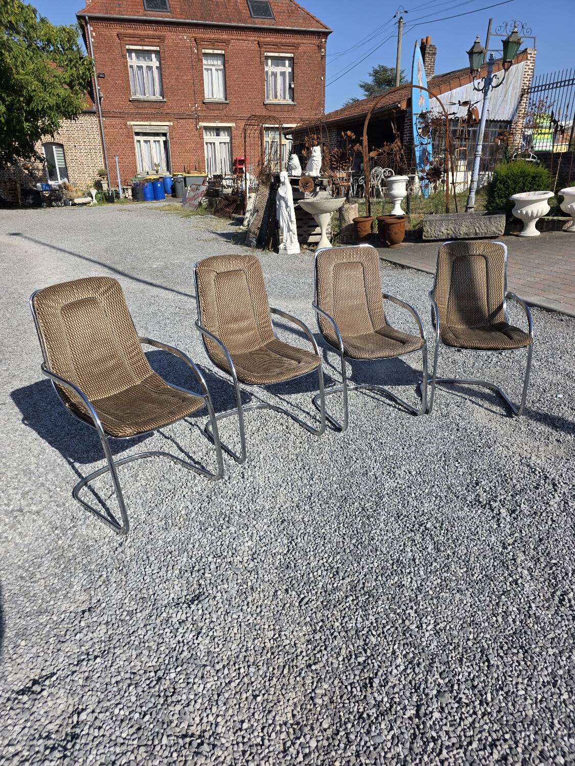 4 chaises Cidue en métal chromé, années 70