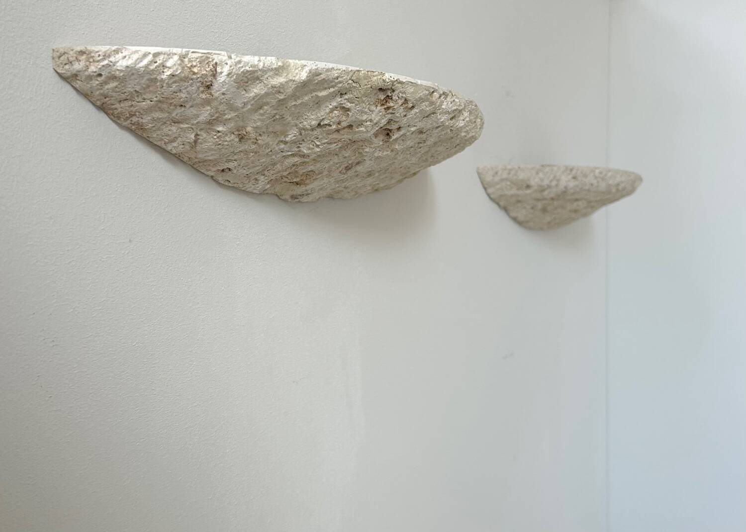 Pair of vintage stone sconces, natural beige, Italy 1979