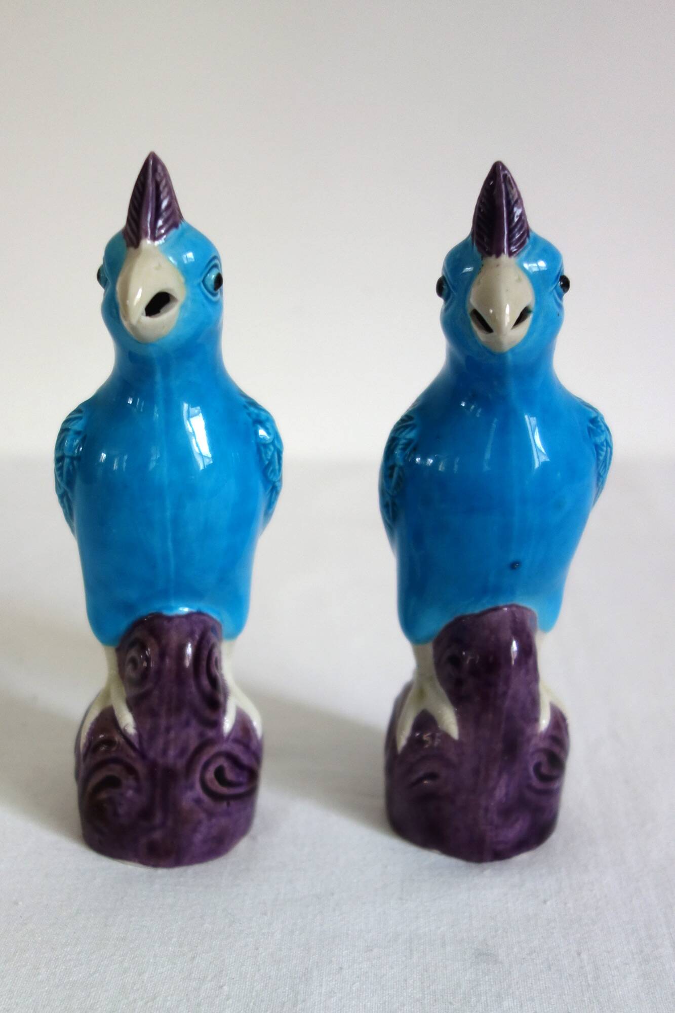 Pair of enamelled porcelain parrots, Chinese, 1960s.