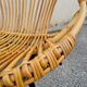 Vintage rattan shell armchair from the 60s
