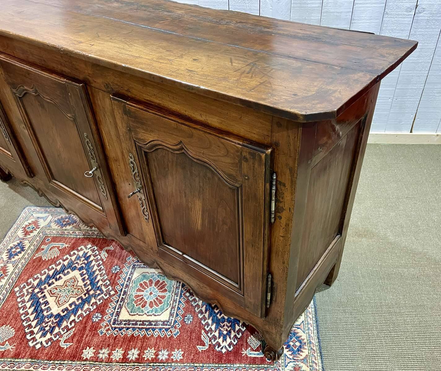 18th century Louis XV 3-door cherrywood sideboard