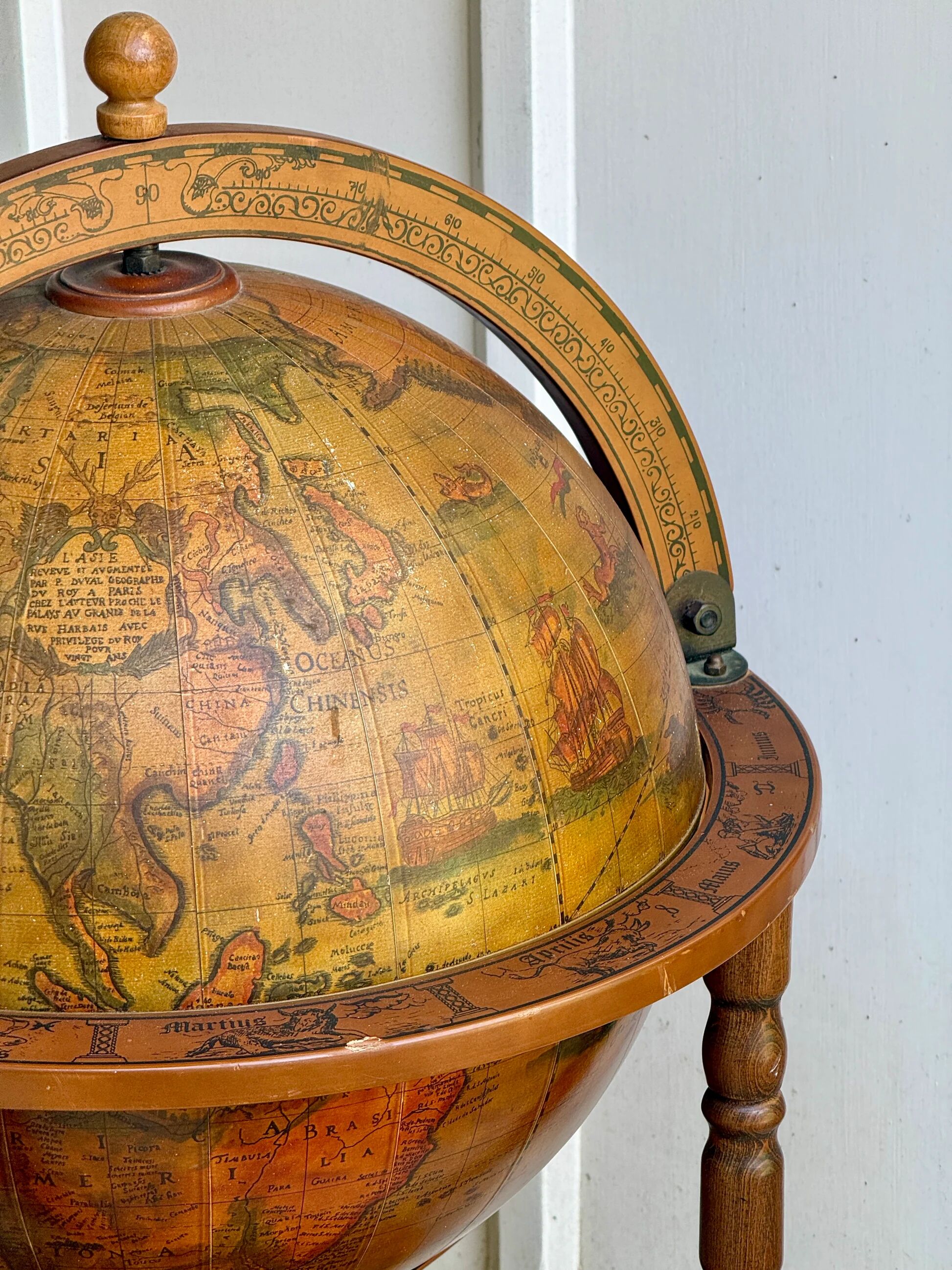 Globe bar on wheels with a rotating tray