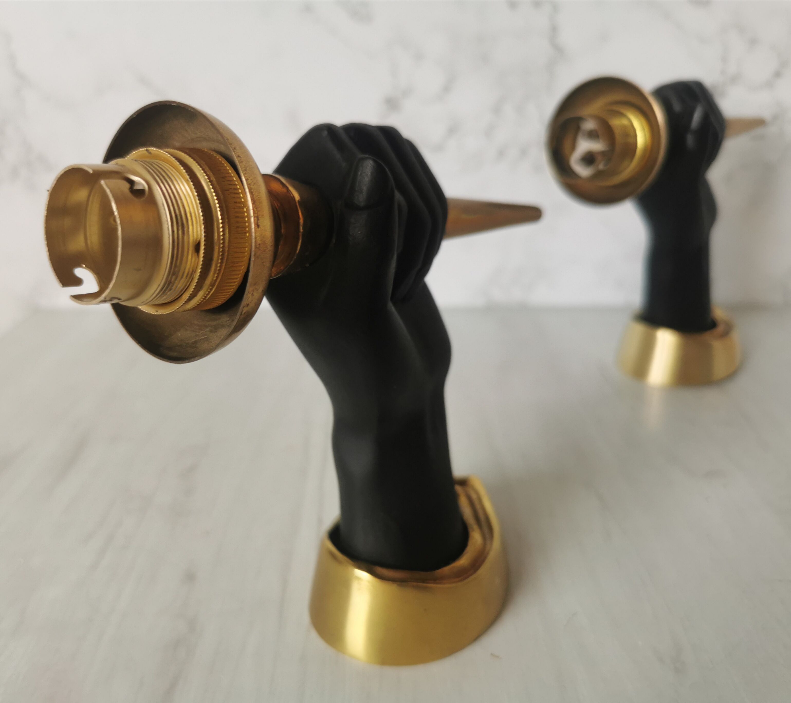 Pair of brass hand flare appliques