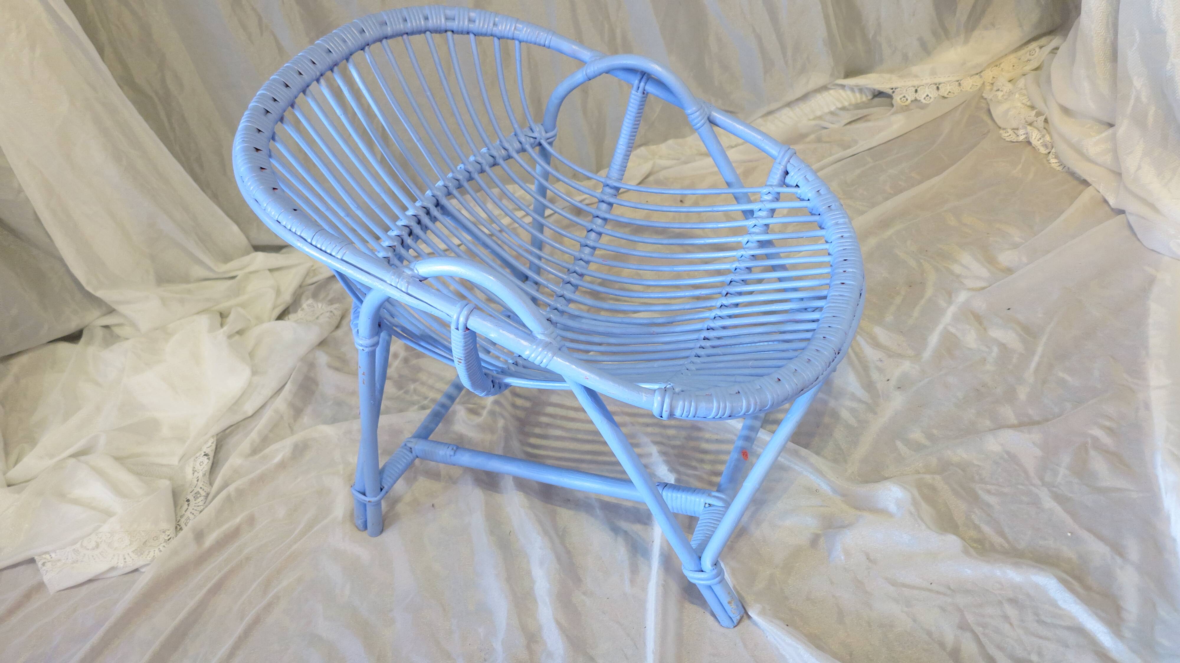 Blue painted rattan armchair