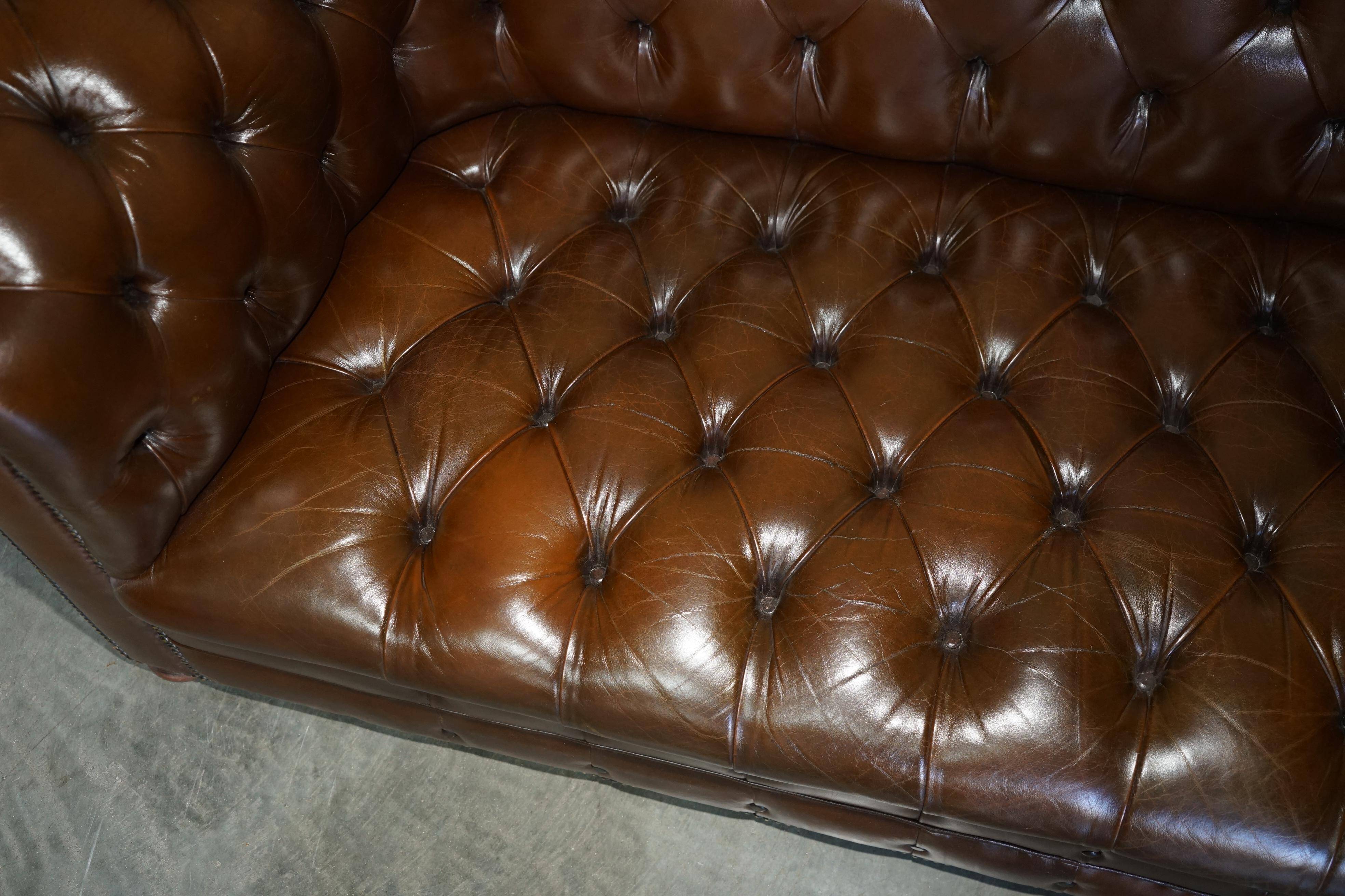 Restored Chesterfield leather sofa in vintage Art Deco style
