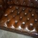 Restored Chesterfield leather sofa in vintage Art Deco style
