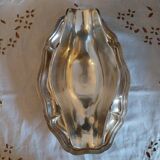 Sauce boat on a scalloped tray in silver metal