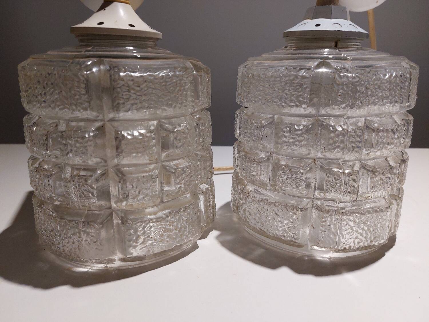 Pair of art deco textured glass chandeliers