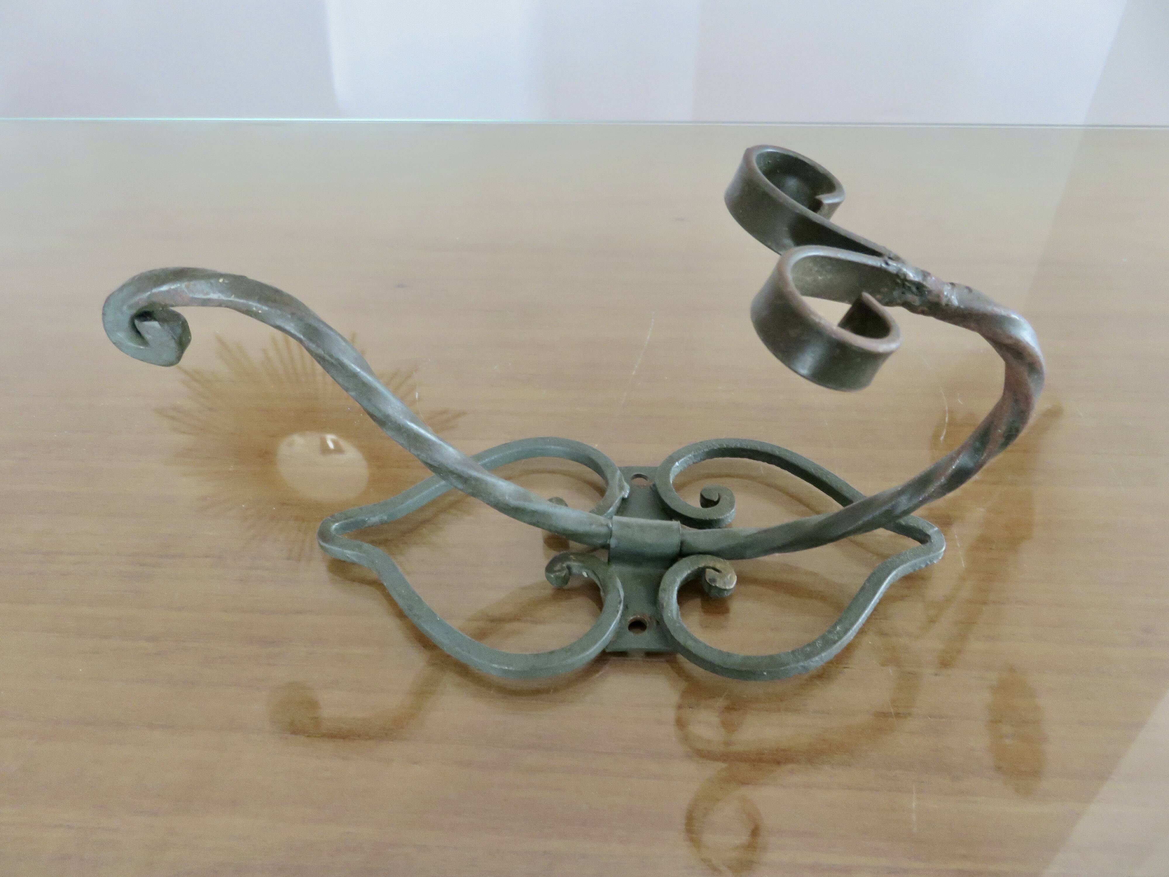 Pair of green lacquered wrought iron wall hooks, art deco, 1930s 40s
