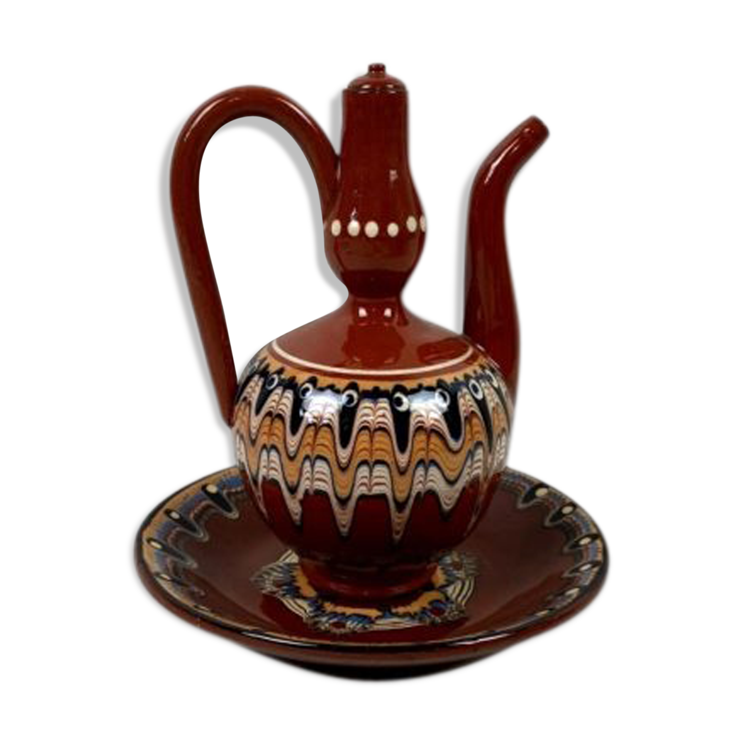 Terracotta teapot and saucer