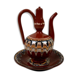 Terracotta teapot and saucer