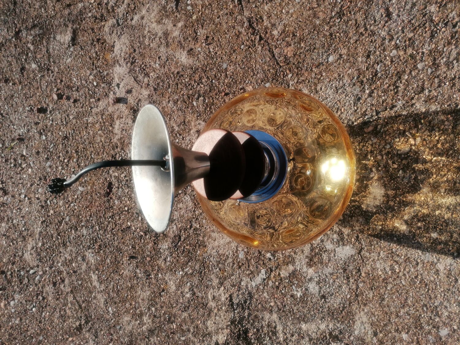 Vintage suspension ball in amber glass