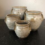 Set of 4 enamelled sandstone pots