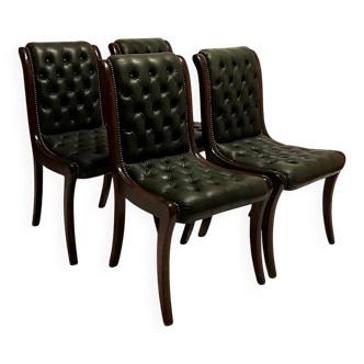 C. 1965 - Set of four “Regency” chairs in deep green tufted leather