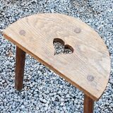 Pair of shepherd's stools in tripod oak décor in the heart