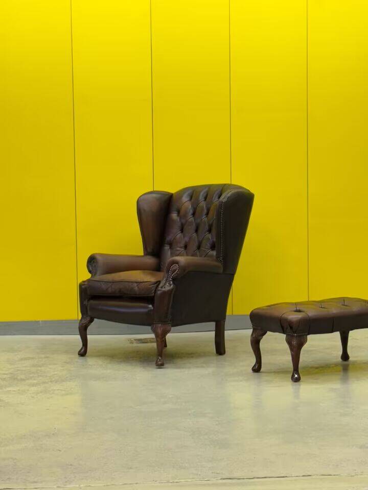 Dark Brown leather chesterfield wing chair with Ottoman