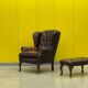 Dark Brown leather chesterfield wing chair with Ottoman