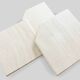 A set of 3 vintage italian travertine nesting tables