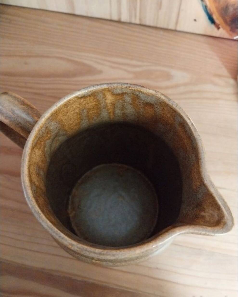 Vintage enamelled stoneware carafe