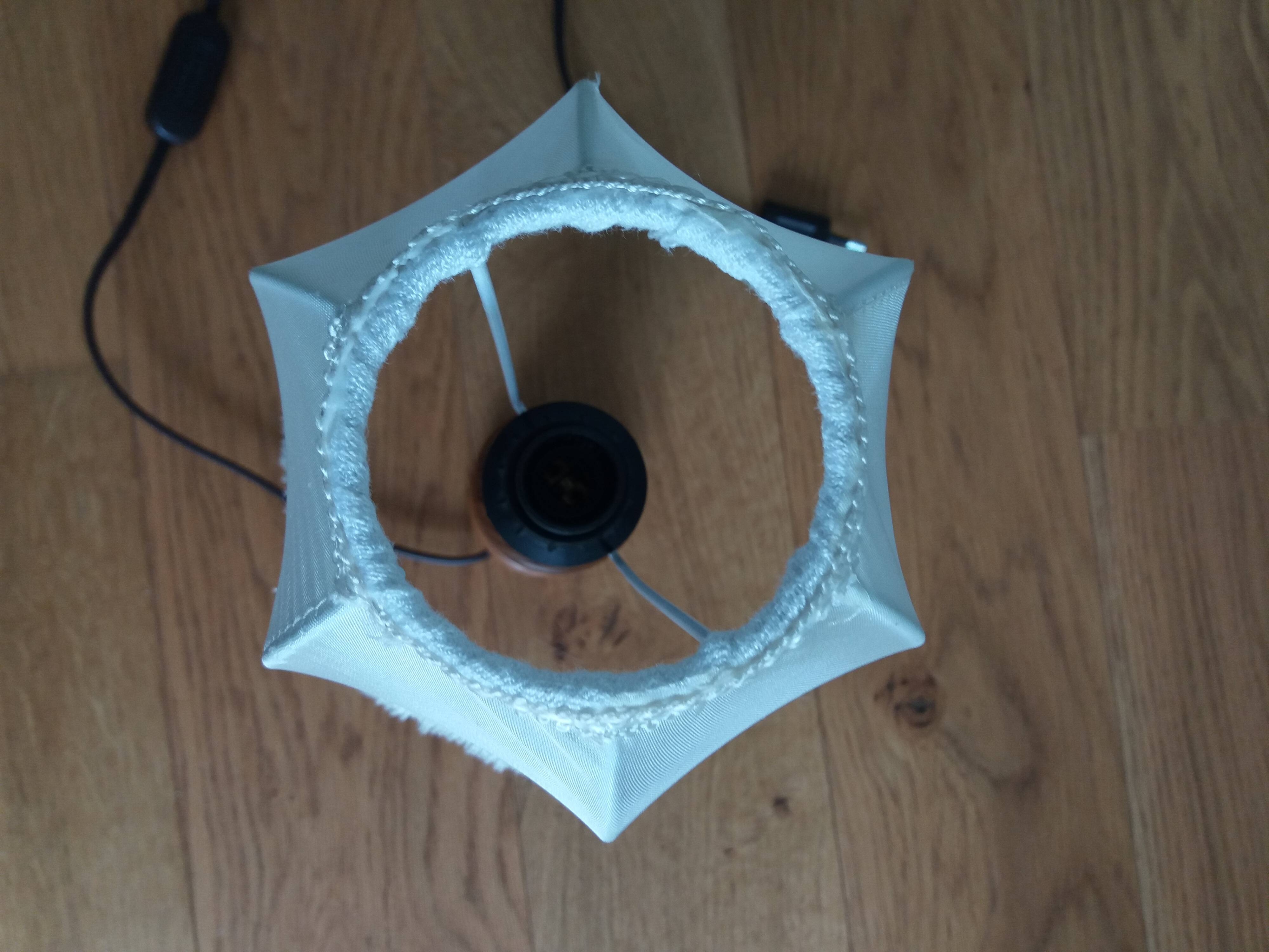 Turned wood lamp with fabric lampshade
