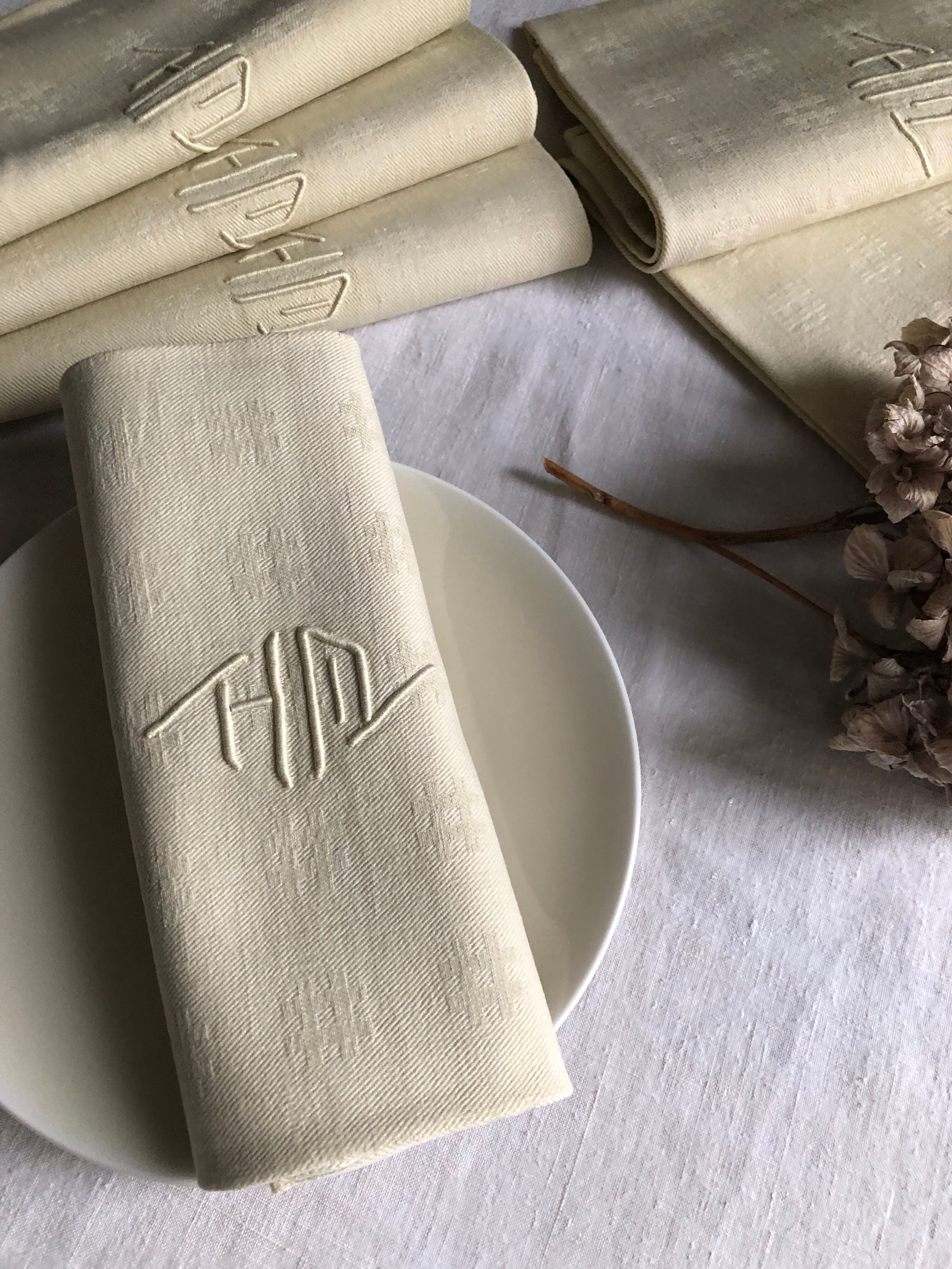 Antique napkins damascus and monogrammed tinted fresh butter
