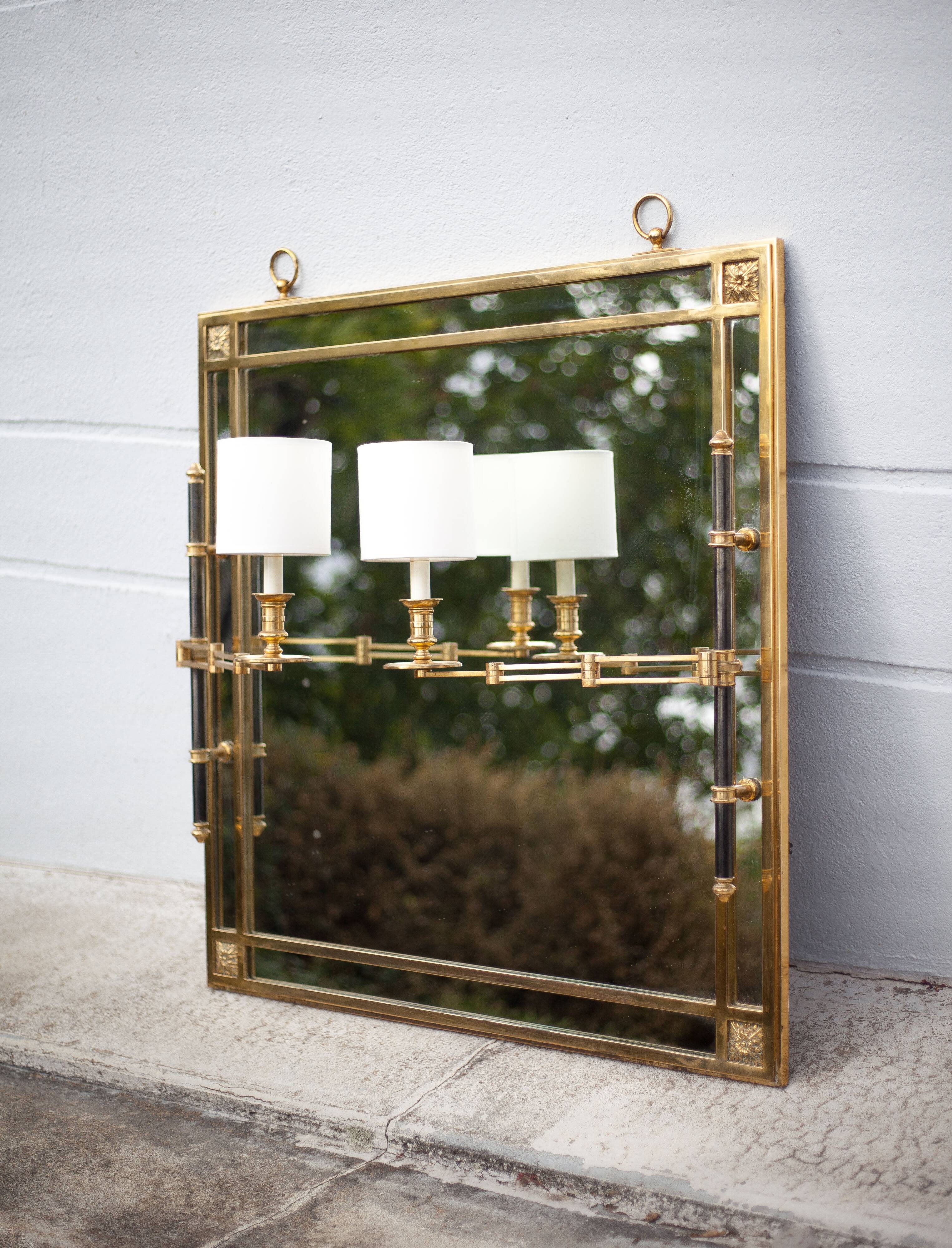 mirror with articulated wall light