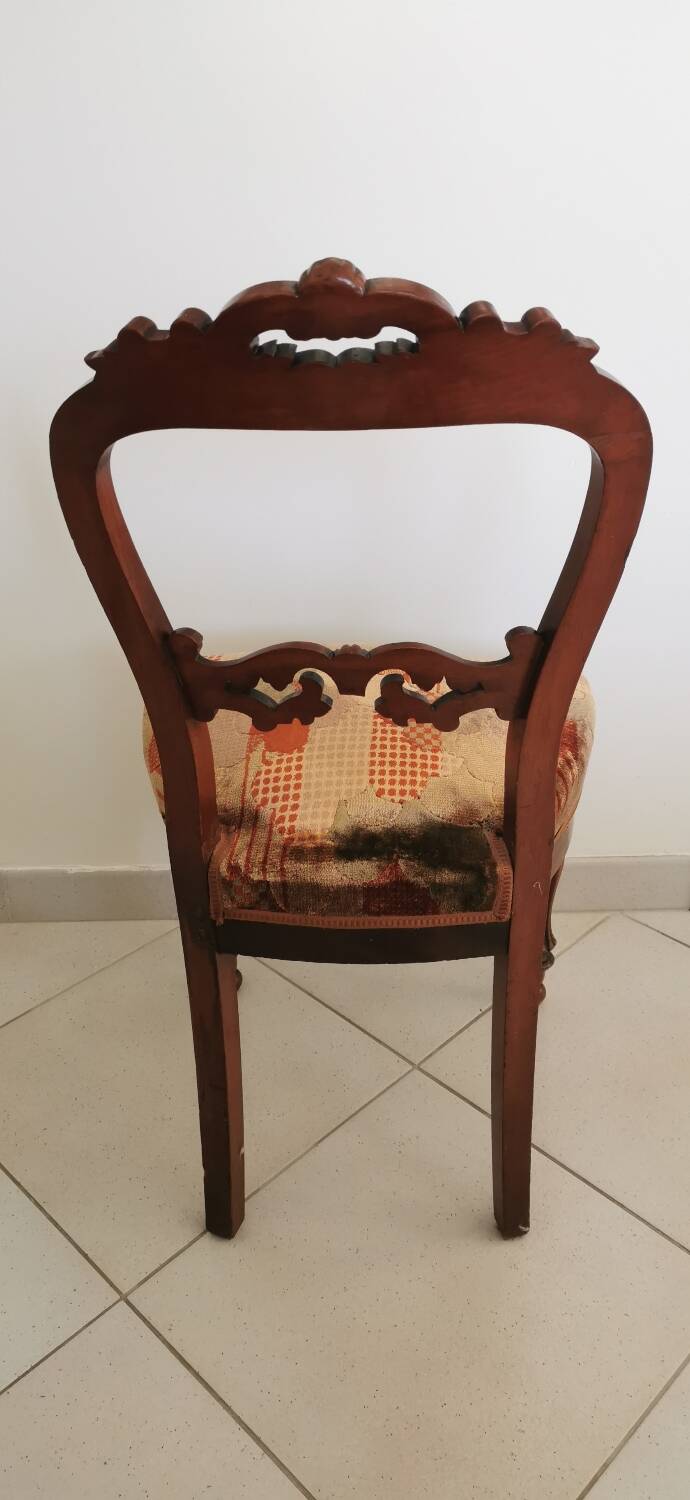 Carved wooden chair and velvet