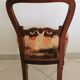 Carved wooden chair and velvet