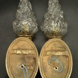 Pair of torchiere wall lights with hands - gilded bronze and black patina