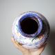 Vintage Portuguese vase in glazed terracotta with hand-painted floral decoration.