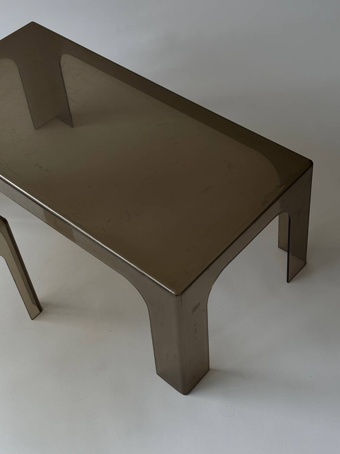 Smoked plastic coffee tables 1970