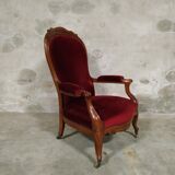 Walnut and velvet armchair