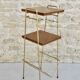 Pedestal table holders magazines in gilded metal and wood, 70s