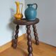 Tripod stool in wood turned coil way
