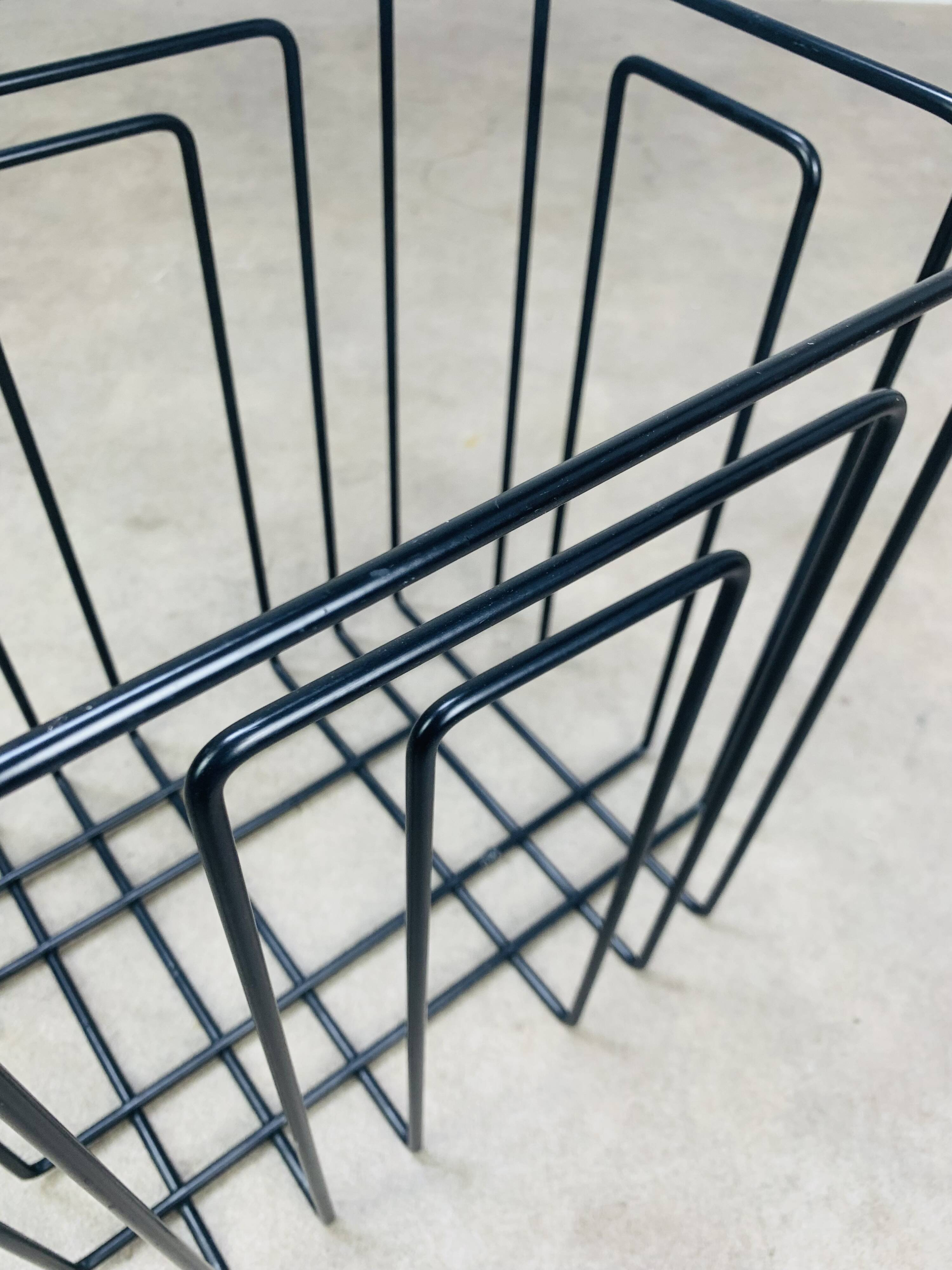 Black metal magazine rack by Willy Glaeser for TMP, 1980s.