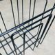 Black metal magazine rack by Willy Glaeser for TMP, 1980s.