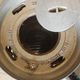 Old compact wood stove in enamelled cast iron with tripod feet with Lion's legs