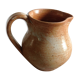 Milk pot in sizzles