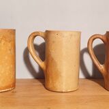 Set of three large sandstone mugs