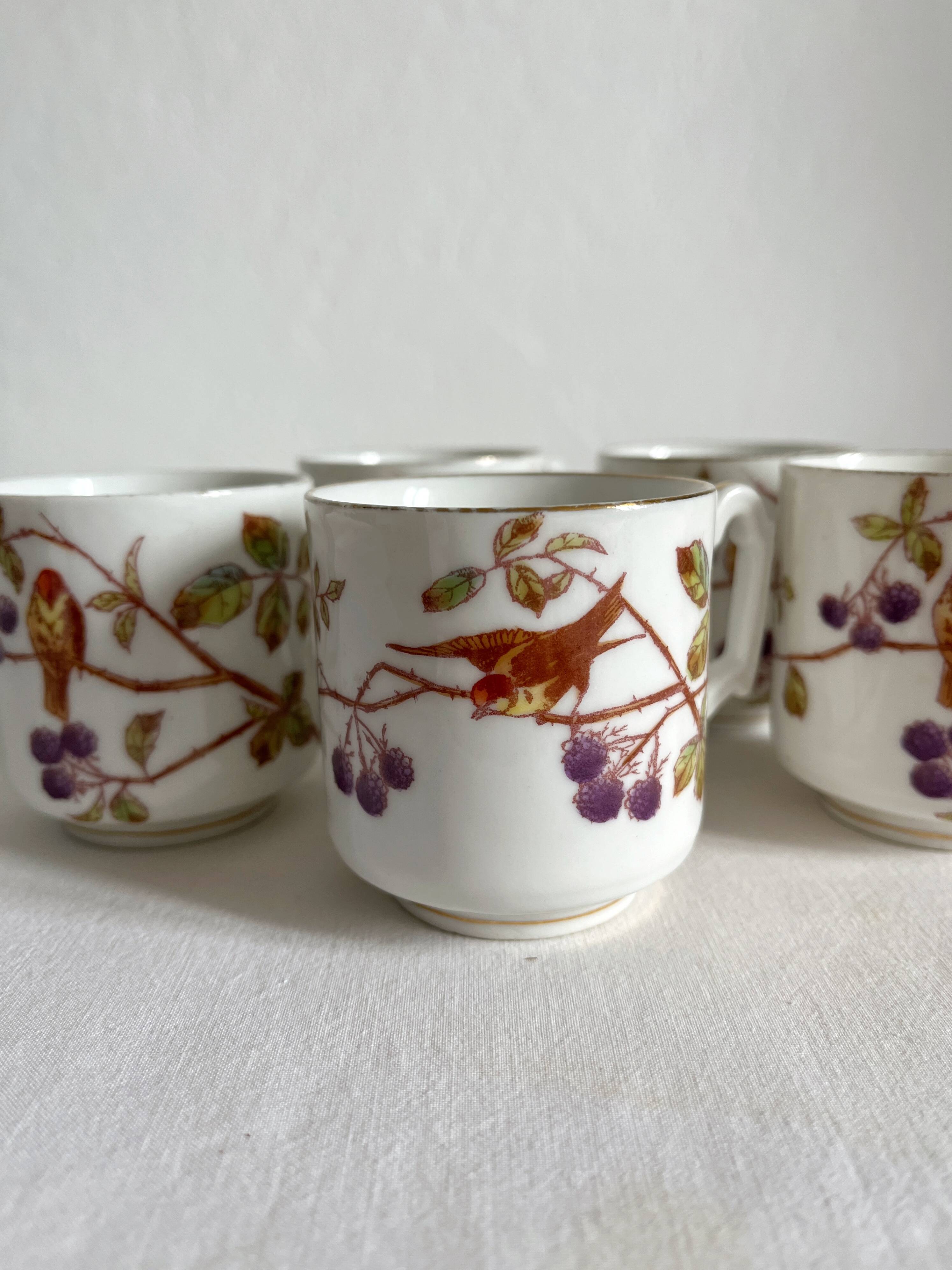 5 antique porcelain coffee cups decorated with birds